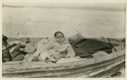 Image of Herbert Decker's little girl in boat on sledge